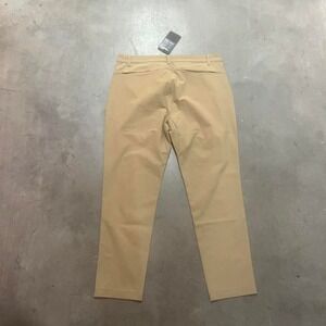 NWT Fabletics men tan "Don trouser" slim fit water resistant 6 way stretch 35